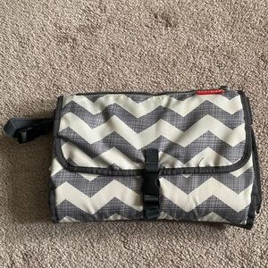 Skip Hop diaper changing pad.